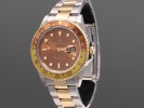 SÅLD - Rolex GMT Master II Guld/Stål 16713 Root Beer, Full set
