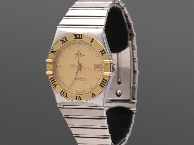 SÅLD - Omega Constellation Quartz Date Guld/Stål