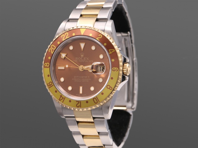 SÅLD - Rolex GMT Master II  Guld/Stål 16713 Root Beer, Full set